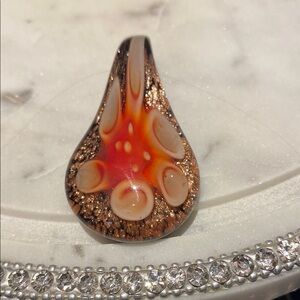 Artistic Glass Pendant with Orange and Gold Accents